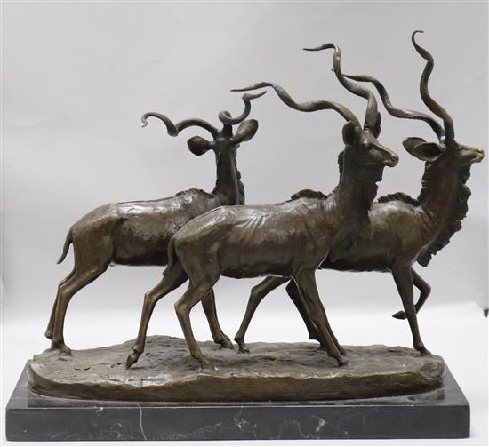 A bronze of three ibex